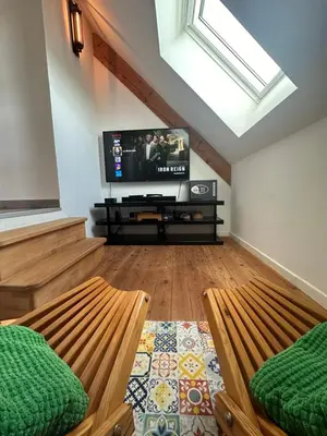 Télévision ou salle de divertissement dans l'établissement La Clé de Taulé