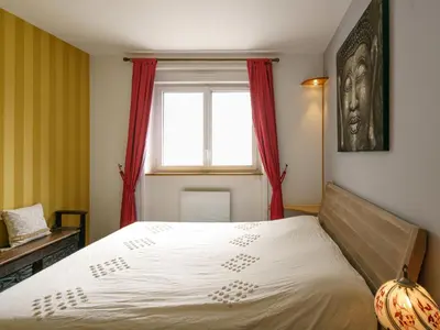 Un ou plusieurs lits dans un hébergement de l'établissement Apartment l'Atlantique by Interhome