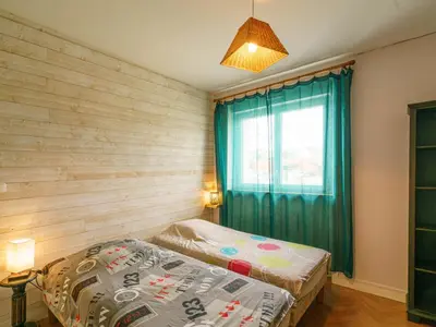 Un ou plusieurs lits dans un hébergement de l'établissement Apartment l'Atlantique by Interhome