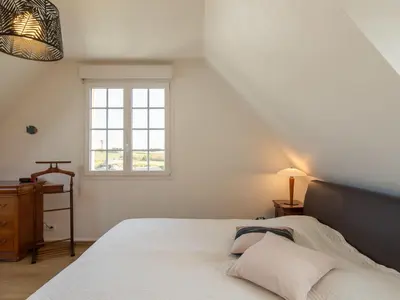 Un ou plusieurs lits dans un hébergement de l'établissement Holiday Home Ty Louarn by Interhome