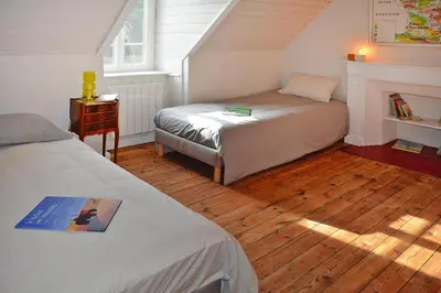 Un ou plusieurs lits dans un hébergement de l'établissement Holiday Home in Locquirec near Sandy Beach