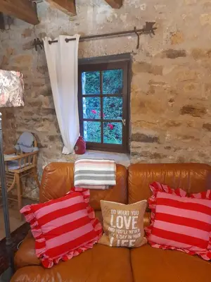Coin salon dans l'établissement Le cottage