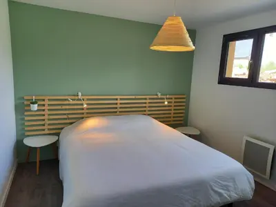 Un ou plusieurs lits dans un hébergement de l'établissement Les Lodges de Beg Leguer - côte de granit rose