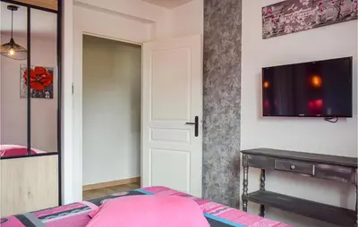 Un ou plusieurs lits dans un hébergement de l'établissement 3 Bedroom Gorgeous Home In Milizac