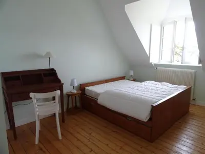 Un ou plusieurs lits dans un hébergement de l'établissement Villa in Primel with Sea View and Beach Access