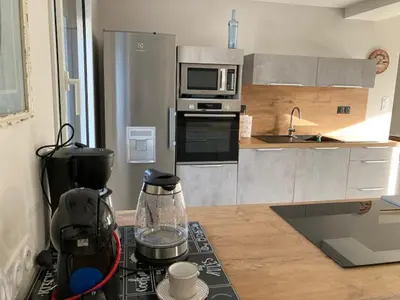 Cuisine ou kitchenette dans l'établissement Les pieds dans le sable