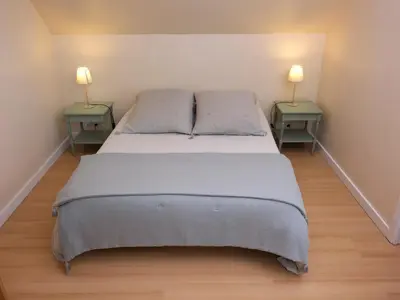Un ou plusieurs lits dans un hébergement de l'établissement Maison près de la plage et de la thalasso