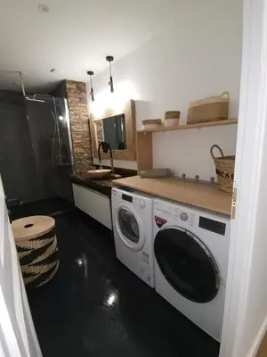 Cuisine ou kitchenette dans l'établissement Loft 100m2 neuf entièrement équipée