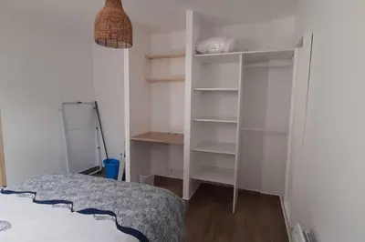 Un ou plusieurs lits dans un hébergement de l'établissement 16Bis 1ch, 2-4pers, jardin Les Gîtes Bigoudens