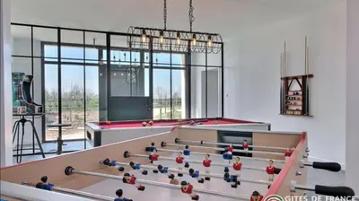 Salle de jeux dans l'établissement Domaine de Kerantroad