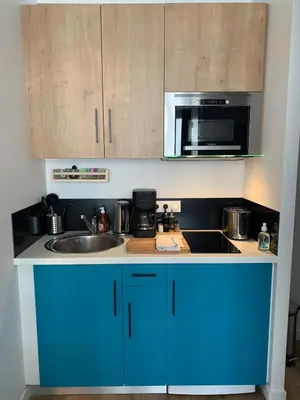 Cuisine ou kitchenette dans l'établissement TY STUDIOS Hyper Centre Ville
