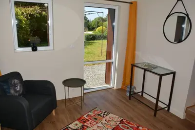 Coin salon dans l'établissement Le clos de la lande vallée