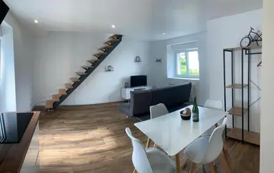 Coin salon dans l'établissement Duplex calme et cosy II