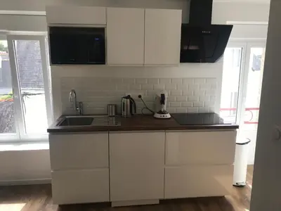 Cuisine ou kitchenette dans l'établissement Duplex calme et cosy II