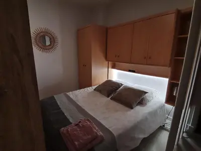 Un ou plusieurs lits dans un hébergement de l'établissement Appartement cosy Roscoff 50 m plage thalasso WIFI PARKING