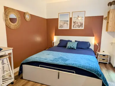 Un ou plusieurs lits dans un hébergement de l'établissement Studio Cosy, entre Abers & Plages, proche du GR34