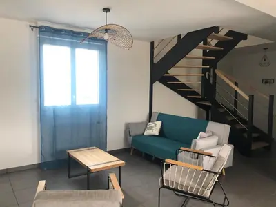 Coin salon dans l'établissement La casa sovaïna maison neuve à 300m de la plage des amiets