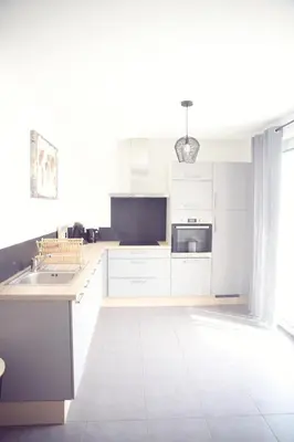 Cuisine ou kitchenette dans l'établissement La casa sovaïna maison neuve à 300m de la plage des amiets