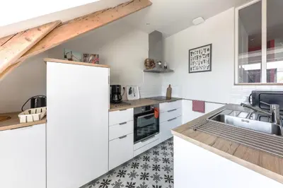 Cuisine ou kitchenette dans l'établissement Cap Ouest