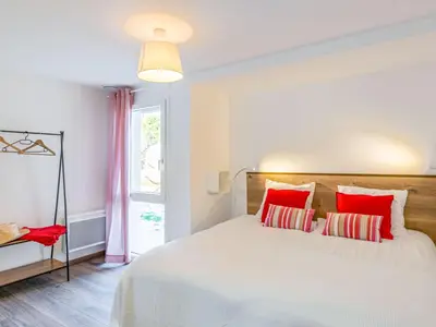 Un ou plusieurs lits dans un hébergement de l'établissement Holiday Home La Ganivelle by Interhome