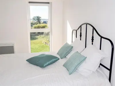 Un ou plusieurs lits dans un hébergement de l'établissement Holiday Home La Ganivelle by Interhome