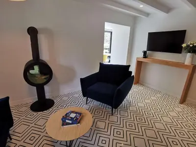 Télévision ou salle de divertissement dans l'établissement Domaine de Stang Bihan