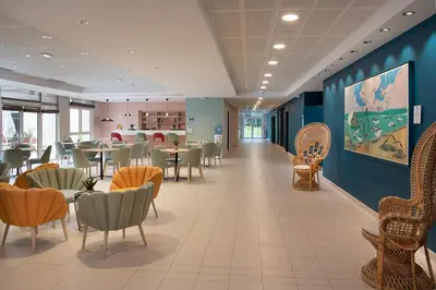 Coin salon dans l'établissement Domitys Les Houblons
