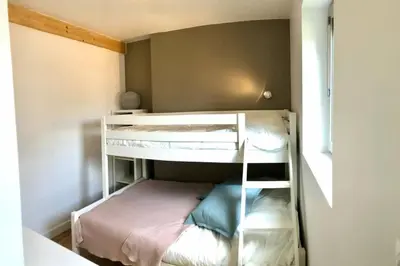 Un ou plusieurs lits dans un hébergement de l'établissement NOUVEAU La cabine du bout du monde Ile Vierge votre résidence bretonne de haut standing PL05