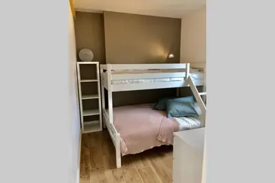Un ou plusieurs lits dans un hébergement de l'établissement NOUVEAU La cabine du bout du monde Ile Vierge votre résidence bretonne de haut standing PL05