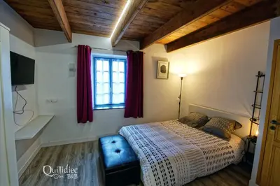 Un ou plusieurs lits dans un hébergement de l'établissement Manoir Pors Braz B&B