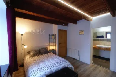 Un ou plusieurs lits dans un hébergement de l'établissement Manoir Pors Braz B&B