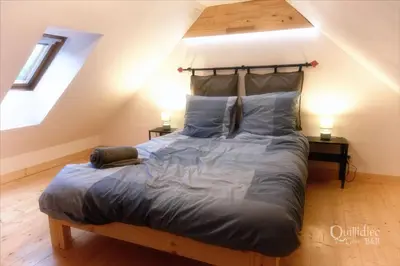 Un ou plusieurs lits dans un hébergement de l'établissement Manoir Pors Braz - Gîte des Boudiged