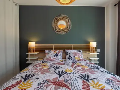 Un ou plusieurs lits dans un hébergement de l'établissement Holiday Home Villa Ty Coz by Interhome