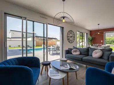Coin salon dans l'établissement Holiday Home Villa Ty Coz by Interhome