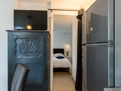 Un ou plusieurs lits dans un hébergement de l'établissement Apartment Terre et Mer by Interhome