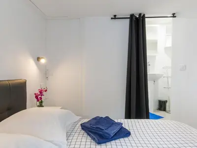 Un ou plusieurs lits dans un hébergement de l'établissement Apartment Terre et Mer by Interhome