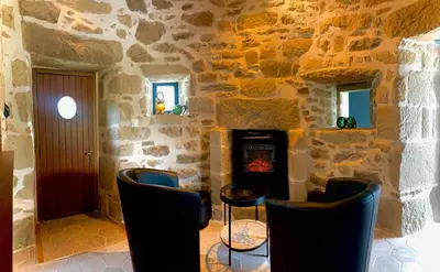 Coin salon dans l'établissement MOULIN DE KERNOT