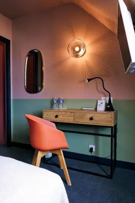 Un ou plusieurs lits dans un hébergement de l'établissement The Originals Boutique, Hôtel Spa Le Triton, Roscoff