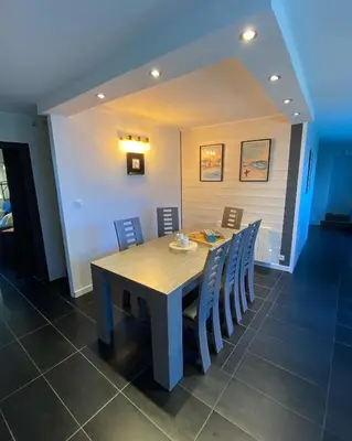 Coin salon dans l'établissement Appartement en entrée de ville avec balneo