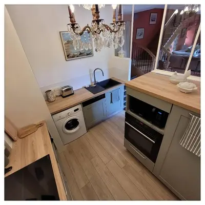 Cuisine ou kitchenette dans l'établissement Gîte de charme au Manoir du Plessis-Quinquis