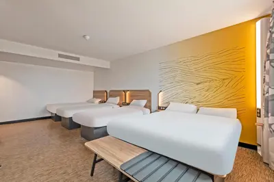 Un ou plusieurs lits dans un hébergement de l'établissement B&B HOTEL Brest Centre Port de Commerce