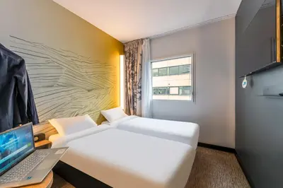 Un ou plusieurs lits dans un hébergement de l'établissement B&B HOTEL Brest Centre Port de Commerce