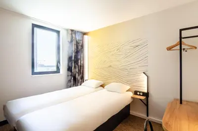 Un ou plusieurs lits dans un hébergement de l'établissement B&B HOTEL Brest Centre Port de Commerce