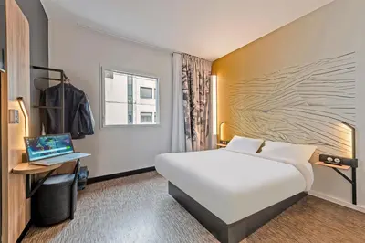 Un ou plusieurs lits dans un hébergement de l'établissement B&B HOTEL Brest Centre Port de Commerce