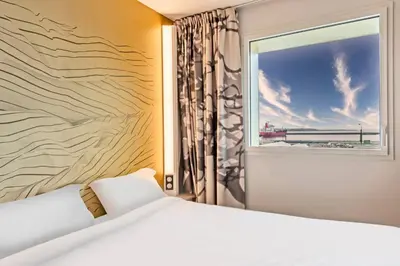 Un ou plusieurs lits dans un hébergement de l'établissement B&B HOTEL Brest Centre Port de Commerce
