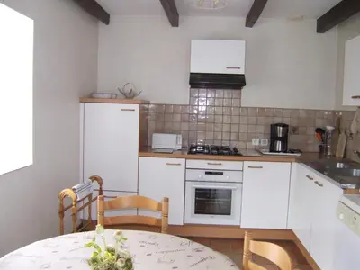 Cuisine ou kitchenette dans l'établissement Penty de Kervillerm