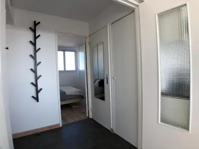 Un ou plusieurs lits dans un hébergement de l'établissement Superbe appartement avec une vue mer panoramique