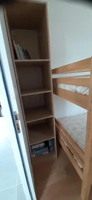 Un ou plusieurs lits dans un hébergement de l'établissement Petite maison plain-pied, proche des plages