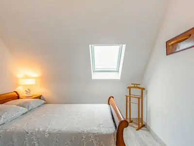 Un ou plusieurs lits dans un hébergement de l'établissement Holiday Home Les Dunes by Interhome