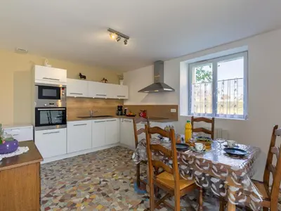 Cuisine ou kitchenette dans l'établissement Holiday Home Ty Ruz by Interhome